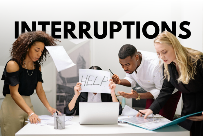 A group of workers with constant interruptions.